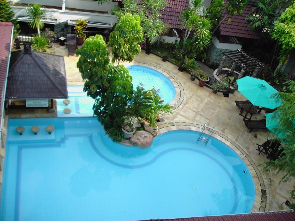 Resor Tuban Tropis Hotel Bagian luar foto